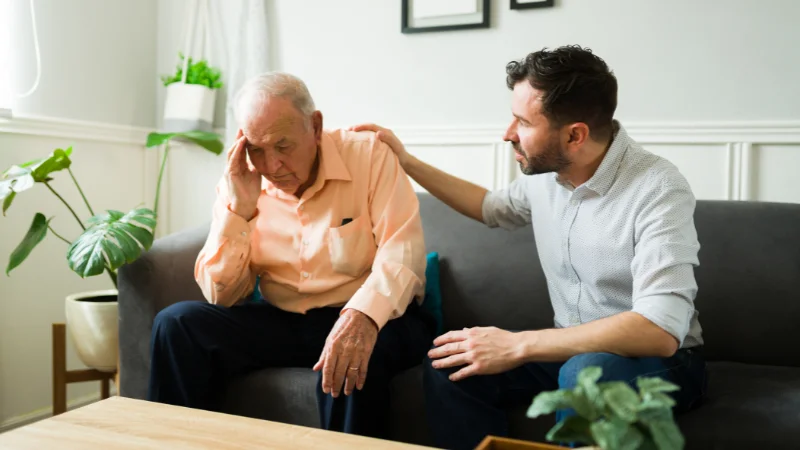 Caregiver and senior spending time together during a simple activity at home