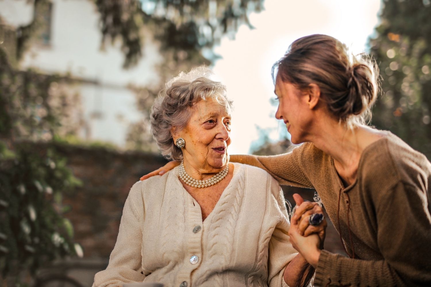 Caregiver respectfully assisting a senior with personal care and daily routines