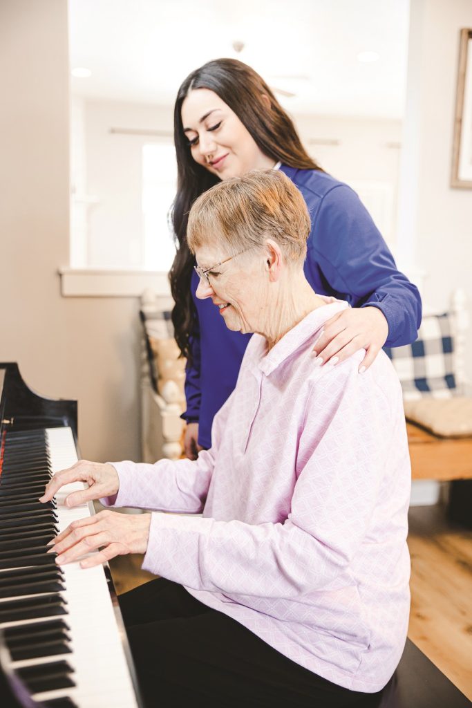 “Compassionate home caregiver providing companionship to an elderly client in Layton, Utah.”