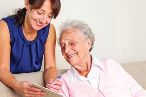 Adult daughter discussing home care needs with aging mother in New Braunfels