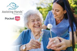 An Assisting Hands Home Care caregiver smiles warmly with an elderly woman outdoors, representing the compassionate support available through home health care services in Murray, UT. The image also features the PocketRN logo, reflecting the virtual nursing partnership that enhances the Medicare GUIDE program. Families seeking in home care for seniors in Murray, UT can access this level of personalized, coordinated care through the Medicare GUIDE program.