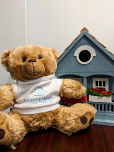 Caregiver-Bear-Assisting-Hands