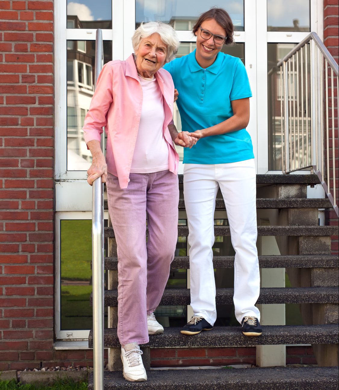 Caregiver-with-Senior-Outside-on-Stairs