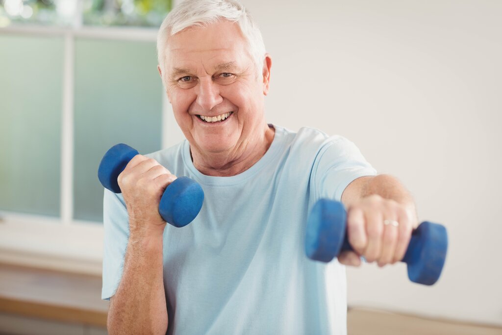 Senior Man Exercising with Dumbbells