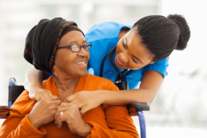 female caregiver talking with a female patient