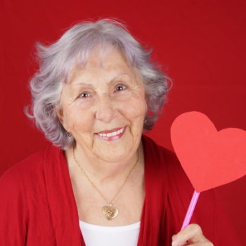 Senior-Holding-Heart-Stick-Valentines-Day