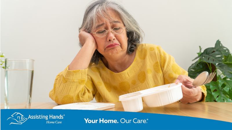 Confused elderly adult struggling with mealtime and low appetite