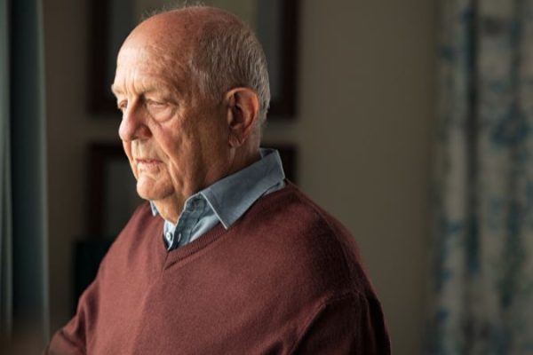sad senior man who lost interest in his hobbies