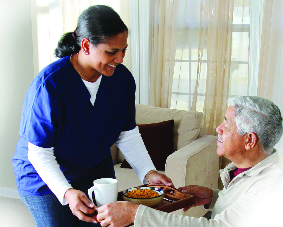 Caregiver helping gentleman