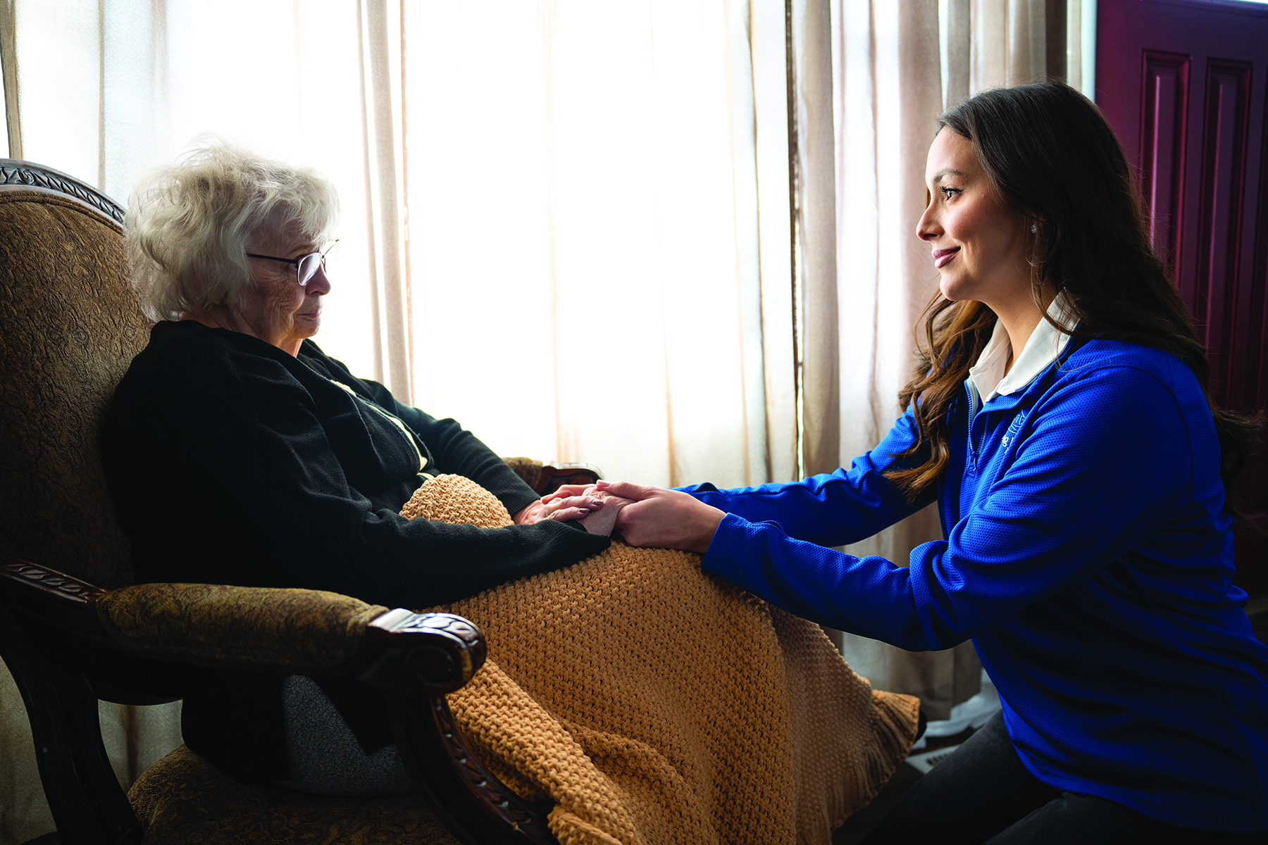 Assisting Hands Home Care Caregiver and Elderly Woman Client | Senior Home Care