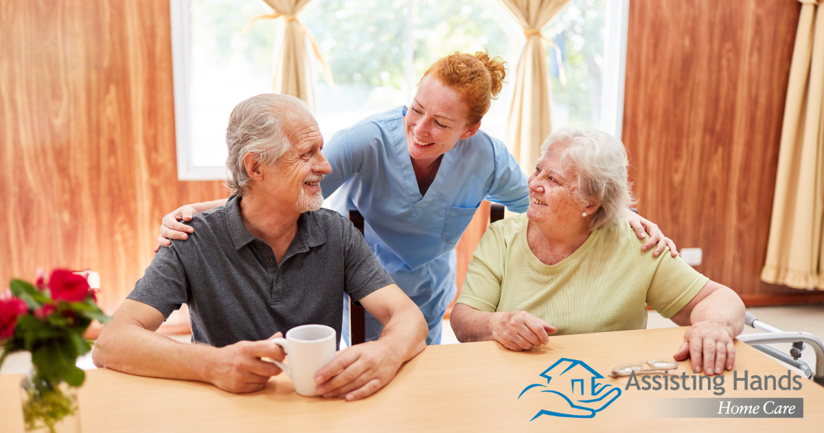 A good caregiving environment can benefit both caregiver and clients, as shown here by this caregiver and her 2 clients.
