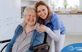 A caregiver enjoys her job as she smiles with a happy client representing the joy that can come from a home care career.