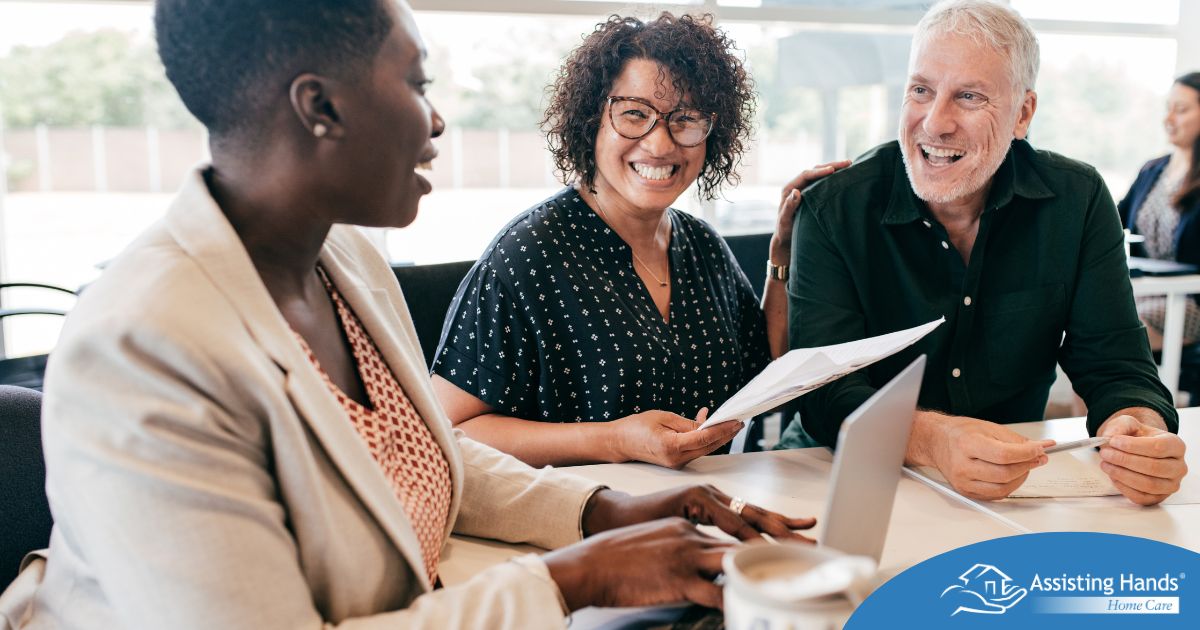 A couple talks with and advisor, representing the type of preparation that is crucial for successful senior care planning.