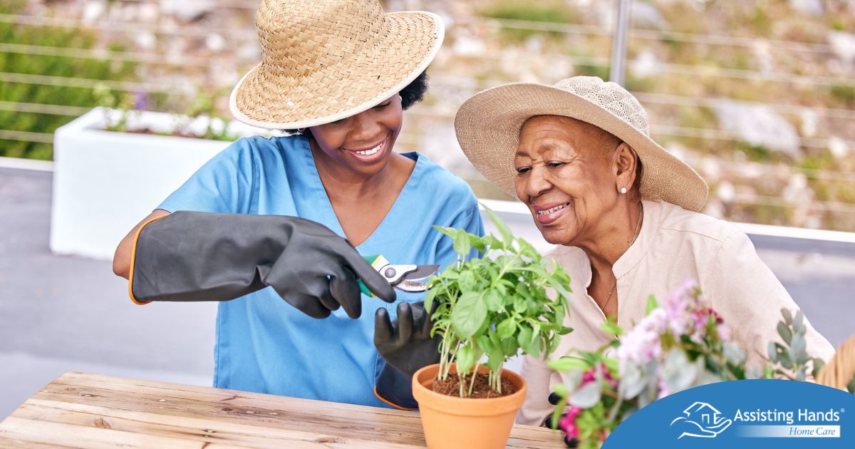 Caregiver and Senior gardening as part of companion care activities.