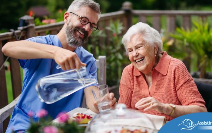 A caregiver applies summer Caregiving Tips including helping a senior stay hydrated.