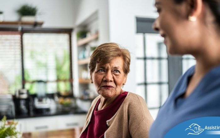 Caregiver provides attentive senior care as part of diabetes awareness