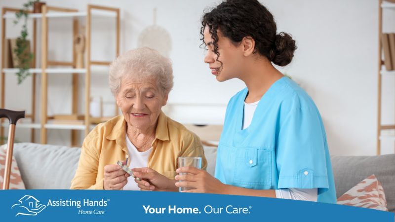 caregiver giving vitamins to seniors as an everyday checklist