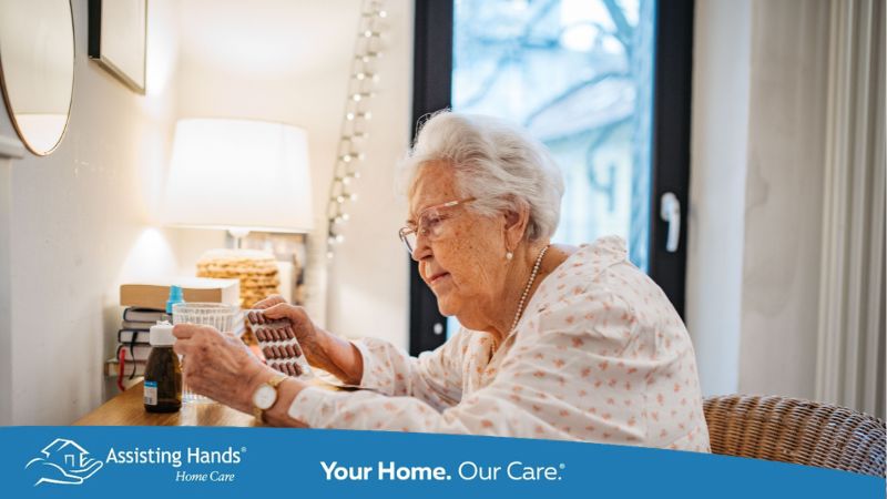 senior woman taking prescribed vitamins after waking up