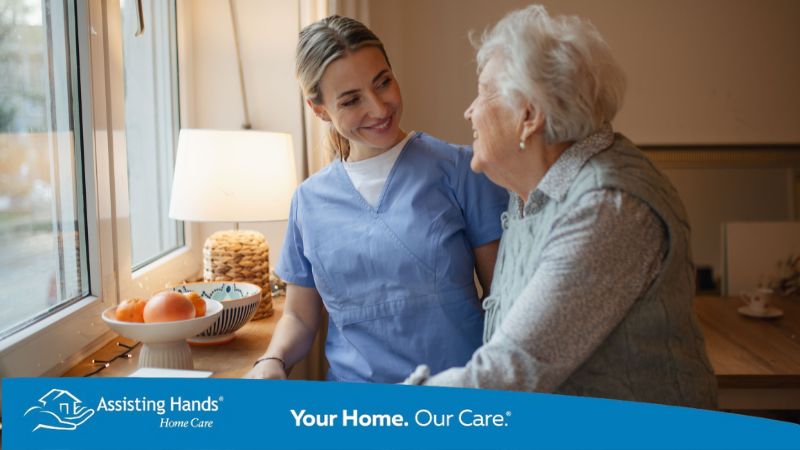 Senior woman receiving compassionate in-home care from a caregiver