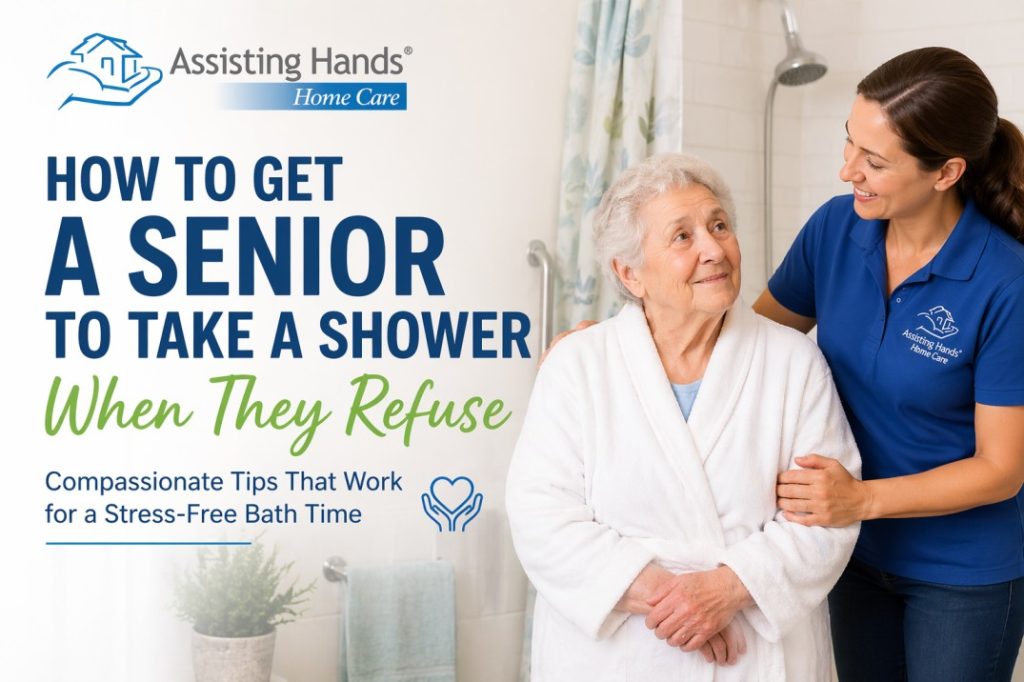Caregiver assisting an elderly woman after a shower in a safe bathroom with text about helping seniors who refuse to bathe.