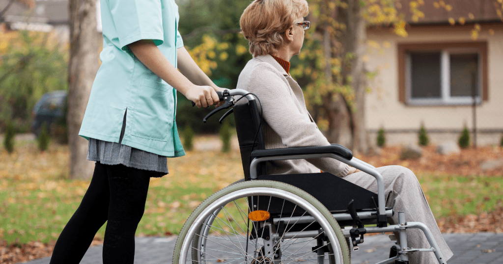 Caregiver-walking-an-elderly