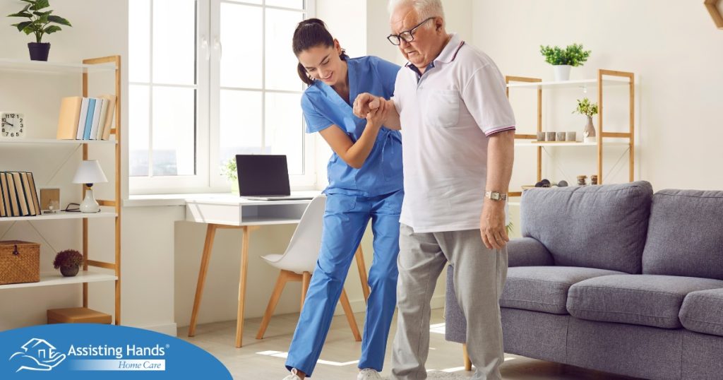 Seniors may need extra help after a fall, and elder care professionals, like this one helping a senior client, can make a massive difference.