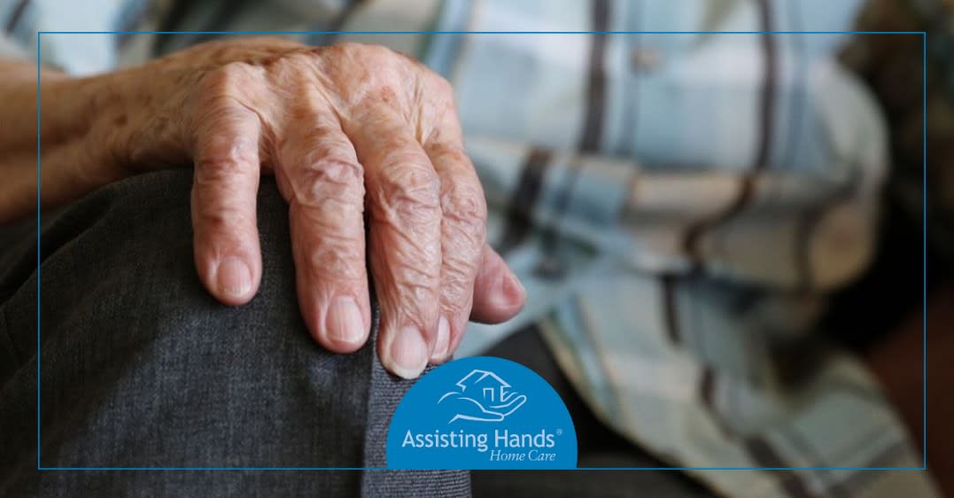 elderly holding knees