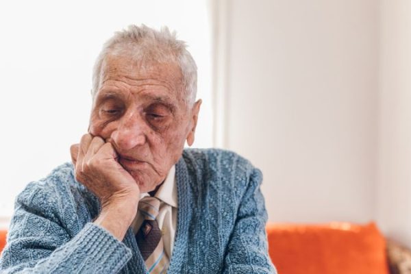 Senior lost in thoughts who has dementia