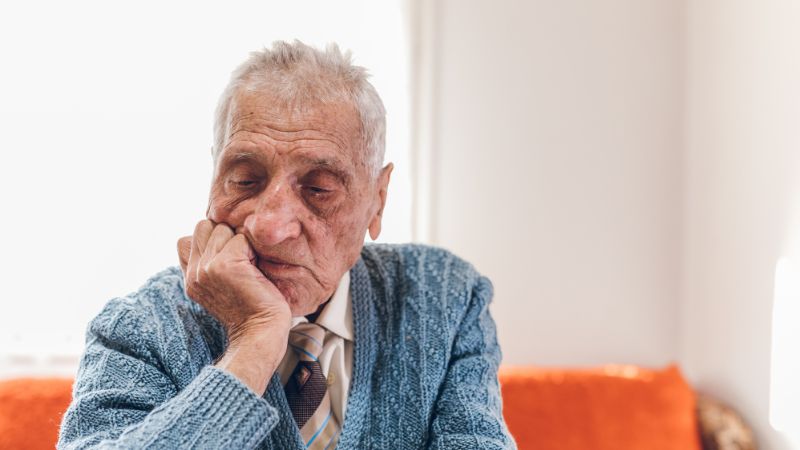 Senior lost in thoughts who has dementia