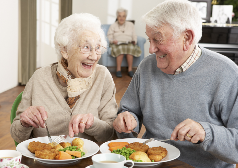 senior couple enjoying meal
