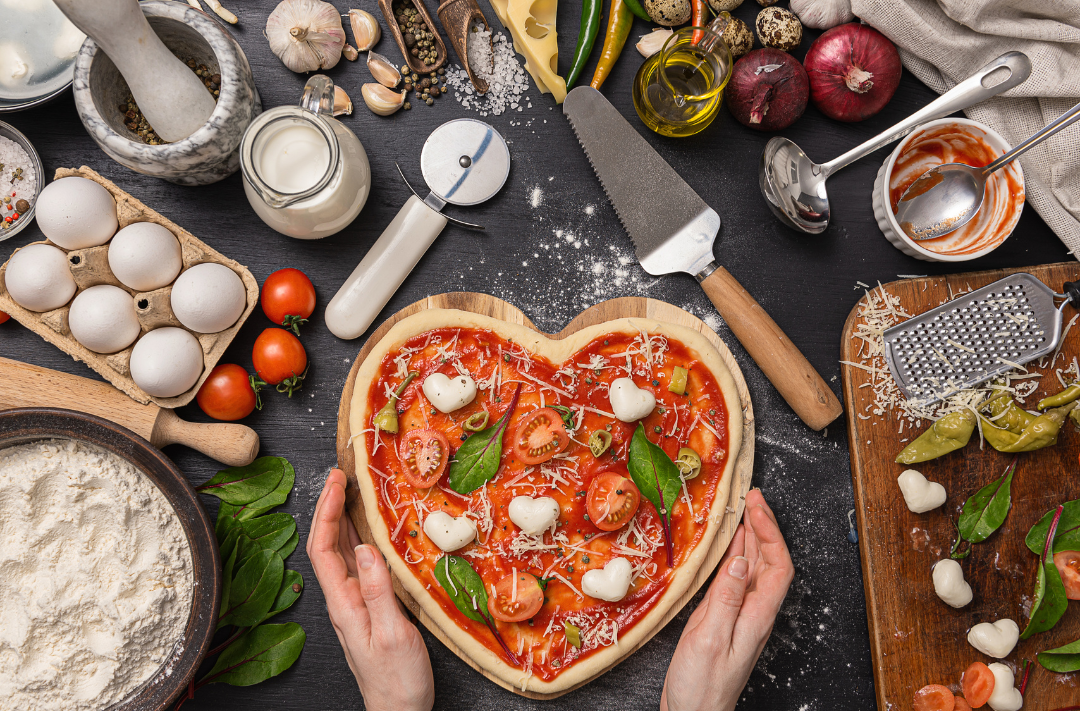 making valentines day heart shaped pizza