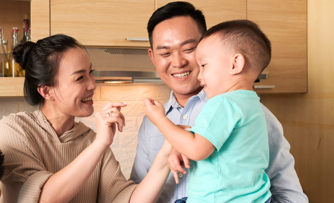 young Vietnamese couple with baby